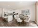 Open floor plan with a modern kitchen and dining area with plenty of natural light at 338 Elgin Dr, Lawrenceville, GA 30045