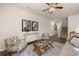 Comfortable living room with stylish seating, accent rug, and ample natural light at 338 Elgin Dr, Lawrenceville, GA 30045