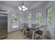 Bright dining area with wood table and chairs at 204 Wesley Mill Ln, Villa Rica, GA 30180