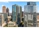 Luxury high-rise building with a pool and stunning city backdrop at 1080 Peachtree Ne St # 1309, Atlanta, GA 30309