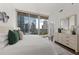 Main bedroom with city views and large windows at 1080 Peachtree Ne St # 1309, Atlanta, GA 30309