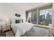 Bright bedroom with city views and large windows at 1080 Peachtree Ne St # 1309, Atlanta, GA 30309