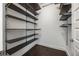 Walk-in closet with ample shelving for storage at 1080 Peachtree Ne St # 1309, Atlanta, GA 30309