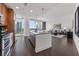 Modern kitchen with island, stainless steel appliances, and city views at 1080 Peachtree Ne St # 1309, Atlanta, GA 30309