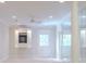 Finished basement featuring a TV niche, glass doors, and recessed lights at 1357 Baniff Ct, Snellville, GA 30078