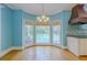 Breakfast nook with large windows and hardwood flooring at 1357 Baniff Ct, Snellville, GA 30078