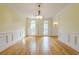 A spacious dining room with hardwood floors and detailed trim at 1357 Baniff Ct, Snellville, GA 30078