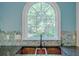 Close up of a kitchen sink and window showing the copper sink at 1357 Baniff Ct, Snellville, GA 30078