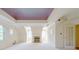 Bright living room with recessed lighting, a fireplace, and ample natural light at 1357 Baniff Ct, Snellville, GA 30078
