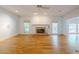 Living room featuring a fireplace and hardwood floors at 1357 Baniff Ct, Snellville, GA 30078