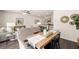 Open concept living room and dining area featuring modern furnishings and decor at 308 Elgin Dr, Lawrenceville, GA 30045