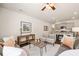 Comfortable living room with modern furnishings and open layout to the kitchen, perfect for relaxing at 308 Elgin Dr, Lawrenceville, GA 30045