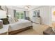 This main bedroom features a large window, ample natural light, and neutral color scheme, creating a relaxing atmosphere at 308 Elgin Dr, Lawrenceville, GA 30045