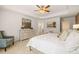 This main bedroom includes tray ceilings, neutral paint, carpet and attached bathroom at 308 Elgin Dr, Lawrenceville, GA 30045