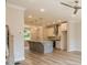 Bright and open living area with light-colored floors, and staircase access at 1956 Deco Dr, Kennesaw, GA 30144