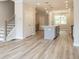 Spacious living area features light floors and staircase at 1956 Deco Dr, Kennesaw, GA 30144