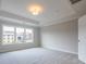 Bright main bedroom features large windows and plush carpet at 1956 Deco Dr, Kennesaw, GA 30144