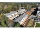 Aerial view of townhouses under construction with surrounding landscape at 1996 Deco Dr, Kennesaw, GA 30144
