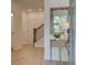 Light and bright entryway with a half bath and view of staircase at 1996 Deco Dr, Kennesaw, GA 30144
