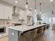 Open concept kitchen with large island and breakfast bar at 1996 Deco Dr, Kennesaw, GA 30144