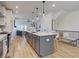 Modern kitchen with a large island and stainless steel appliances at 1996 Deco Dr, Kennesaw, GA 30144