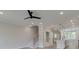 Bright and airy living area with view into kitchen and staircase at 1996 Deco Dr, Kennesaw, GA 30144