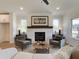 Cozy living room featuring a fireplace and comfortable seating at 1996 Deco Dr, Kennesaw, GA 30144