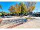 Outdoor plaza with seating, trees, and brick walkways at 1996 Deco Dr, Kennesaw, GA 30144
