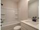 Bathroom with tub, toilet, vanity and mirror at 1980 Deco Dr, Kennesaw, GA 30144