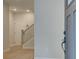 Entryway with wooden floors, stairs, and a gray door at 1980 Deco Dr, Kennesaw, GA 30144