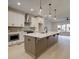 Modern kitchen with stainless steel appliances and island at 1980 Deco Dr, Kennesaw, GA 30144