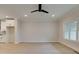 Spacious living room features light wood floors, white trim, and plenty of natural light at 1980 Deco Dr, Kennesaw, GA 30144