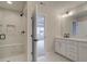 Contemporary bathroom featuring a glass shower with marble tile and a white vanity at 1988 Deco Dr, Kennesaw, GA 30144