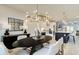 Open floor plan with a spacious dining room featuring a modern chandelier and neutral decor at 1988 Deco Dr, Kennesaw, GA 30144