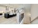 Open floor plan with a bright kitchen, eat-in island and modern design at 1988 Deco Dr, Kennesaw, GA 30144