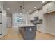 Well-appointed kitchen featuring an island, stainless appliances, white cabinets, and an open layout at 1988 Deco Dr, Kennesaw, GA 30144