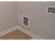 Clean laundry area with connections for a washer and dryer hookups at 1988 Deco Dr, Kennesaw, GA 30144