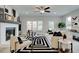 Comfortable living room showcases modern decor, fireplace, and abundant natural light at 1988 Deco Dr, Kennesaw, GA 30144