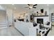 Cozy living room boasts a fireplace, ceiling fan, and an open floor plan with tons of natural light at 1988 Deco Dr, Kennesaw, GA 30144