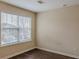 Bedroom with a window and vinyl floors at 1623 Bradmere Ln, Lithia Springs, GA 30122