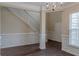 Dining space with wainscoting, hardwood floors, staircase and natural light at 1623 Bradmere Ln, Lithia Springs, GA 30122