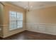 This dining room is enhanced by hardwood floors and a large window that provides great natural light at 1623 Bradmere Ln, Lithia Springs, GA 30122