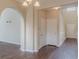 Spacious hallway with hardwood flooring, white trim, and two-story ceiling at 1623 Bradmere Ln, Lithia Springs, GA 30122