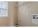 Laundry room featuring window, shelf, and hookups at 1623 Bradmere Ln, Lithia Springs, GA 30122