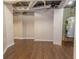 Basement utility area with tanked water heater at 1417 Iris Lake Rd, Mcdonough, GA 30252