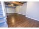 Finished basement with new flooring and updated walls with painted exposed ceiling at 1417 Iris Lake Rd, Mcdonough, GA 30252