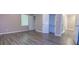 Spacious bedroom featuring new floors, a large closet, and ample natural light at 1417 Iris Lake Rd, Mcdonough, GA 30252