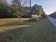 Picturesque open field next to the road, showing the beauty of the landscape at 1417 Iris Lake Rd, Mcdonough, GA 30252