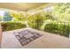 Relaxing covered porch to enjoy your beautiful outdoor landscaping and yard at 1417 Iris Lake Rd, Mcdonough, GA 30252