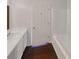 Clean bathroom featuring white cabinets, countertops, and a shower-tub combination at 201 Gallant Se Ln # 25, Mableton, GA 30126